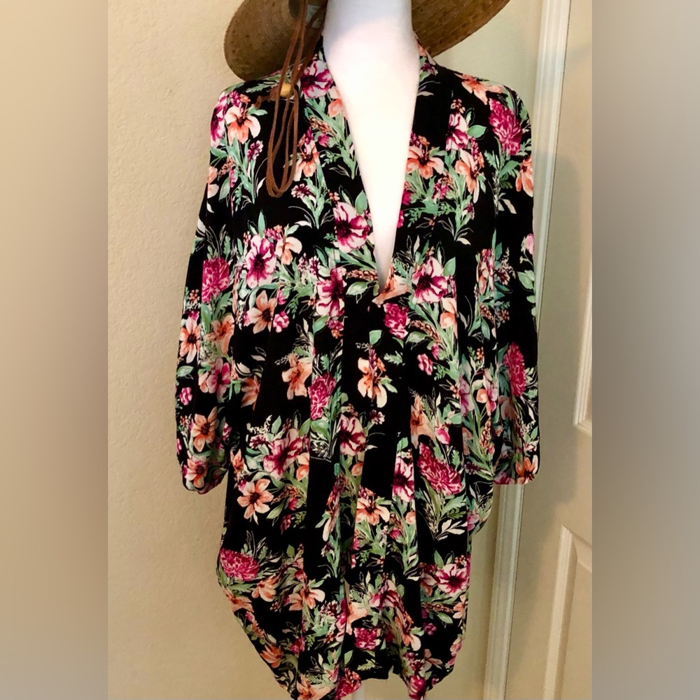 RIP-CURL swimsuit coverup. It is sew on a small spot (see pic 2) to stay closed